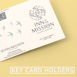 Printed hotel key card holder on a light background