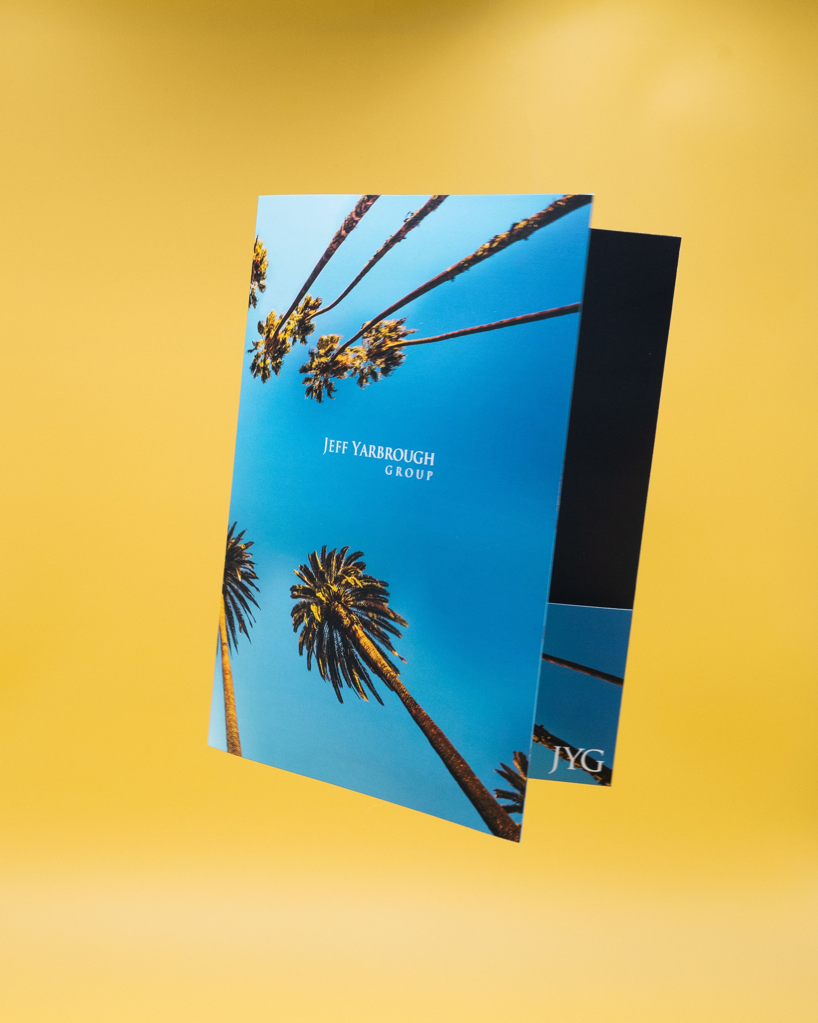 Blue printed folder on yellow background