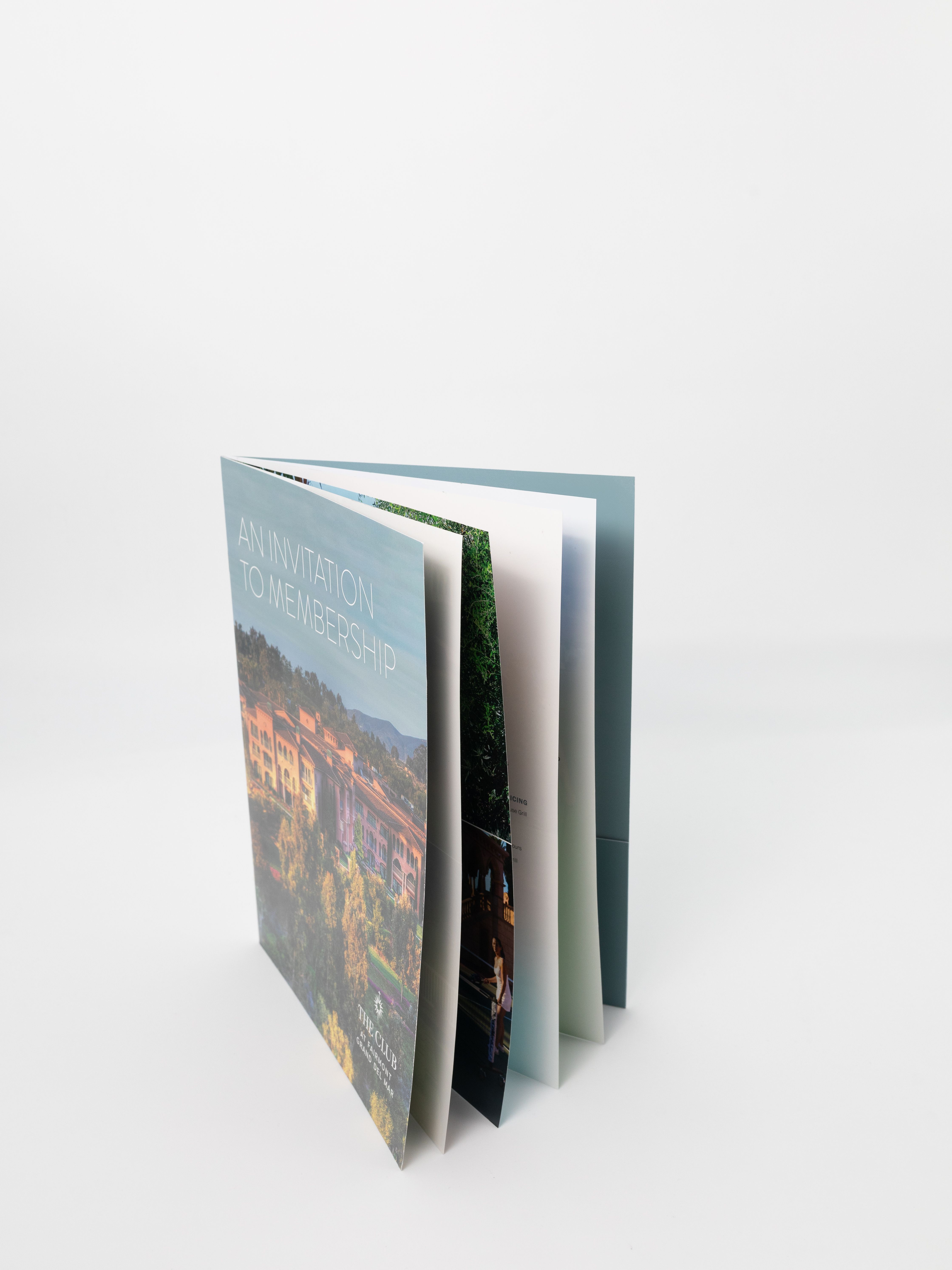 Expanded printed presentation piece with multiple panels