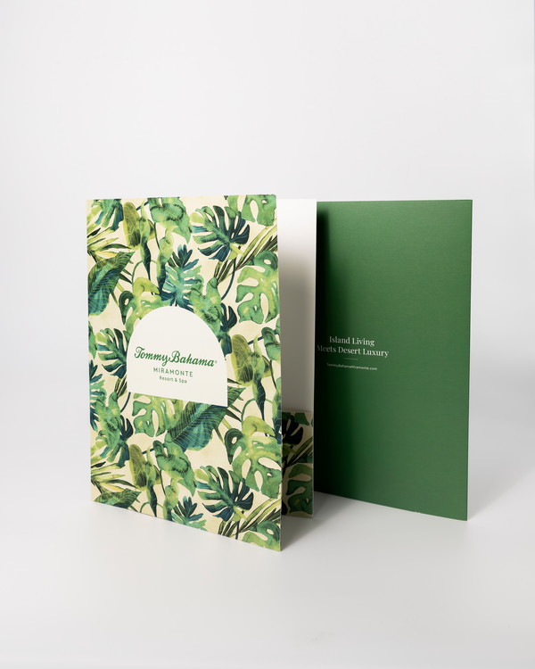Green printed folder standing open